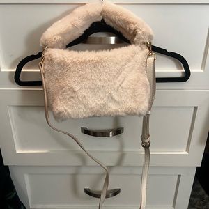 A New Day cream faux fur bag